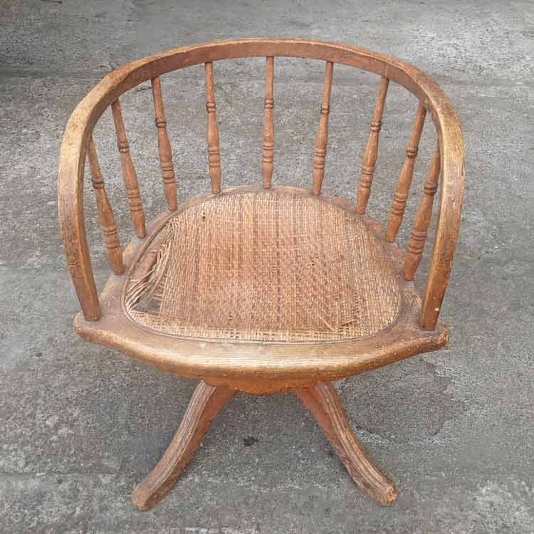This antique swivel chair needed refinishing, and a replacement cane seat panel