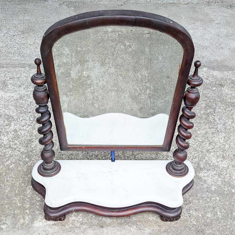 This antique cedar mirror with a marble base, and barley twist details needed stripping and refinishing