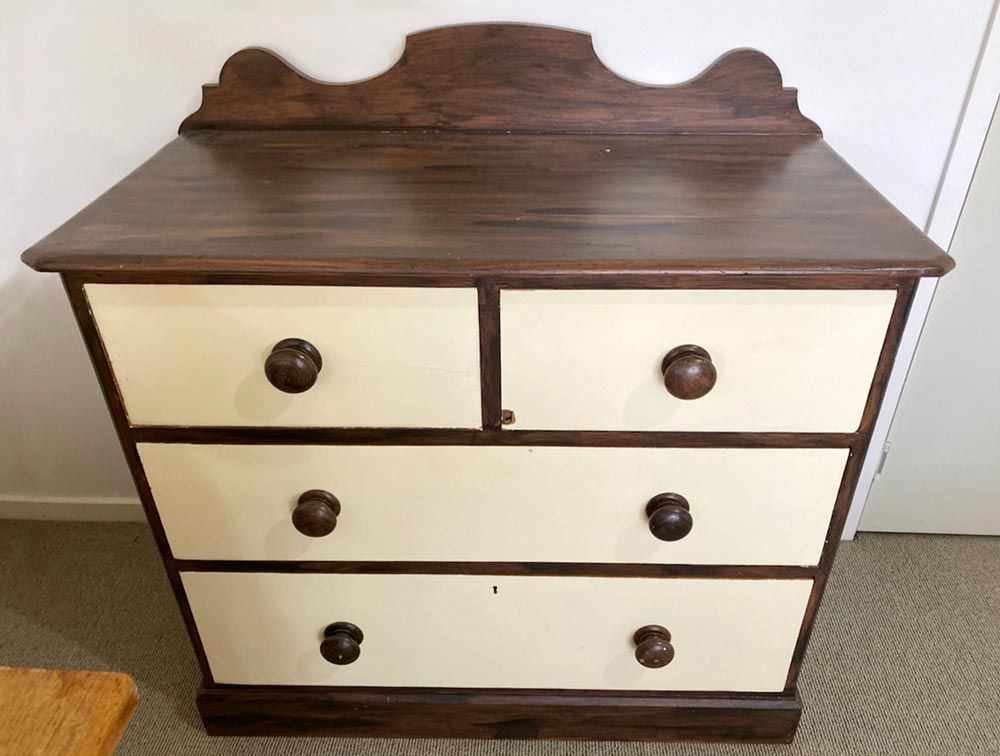 This huon pine chest of drawers had been painted, and had, chips, cracks, and  stains beneth the paint.