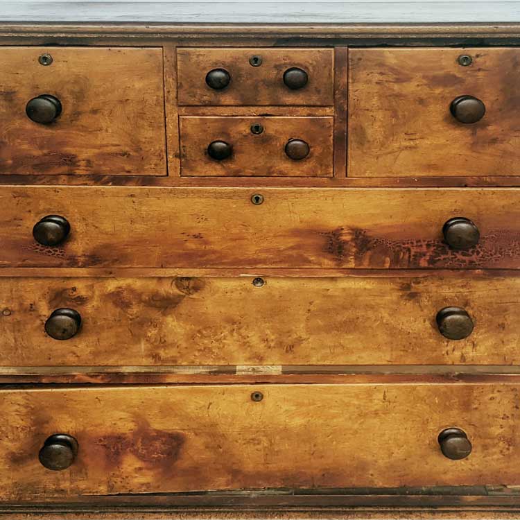 This Huon pine chest of drawers had missing pieces, damaged drawers, and needed refinishing