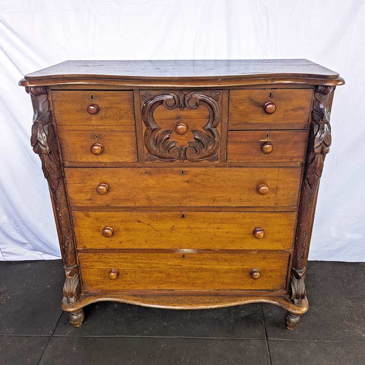 This chest of drawers needed refinishing, and the drawers were stiff and required repairs.